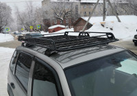 Багажник Уникар для ВАЗ-2123 Chevrolet Niva, LADA Niva Travel с боковым ограждением с сеткой на штатные места