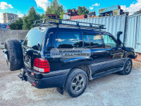 Калитка РИФ с фаркопом в штатный задний бампер Toyota Land Cruiser 100, Lexus LX470 с подсветкой номера