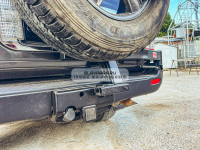 Калитка РИФ с фаркопом в штатный задний бампер Toyota Land Cruiser 100, Lexus LX470 с подсветкой номера